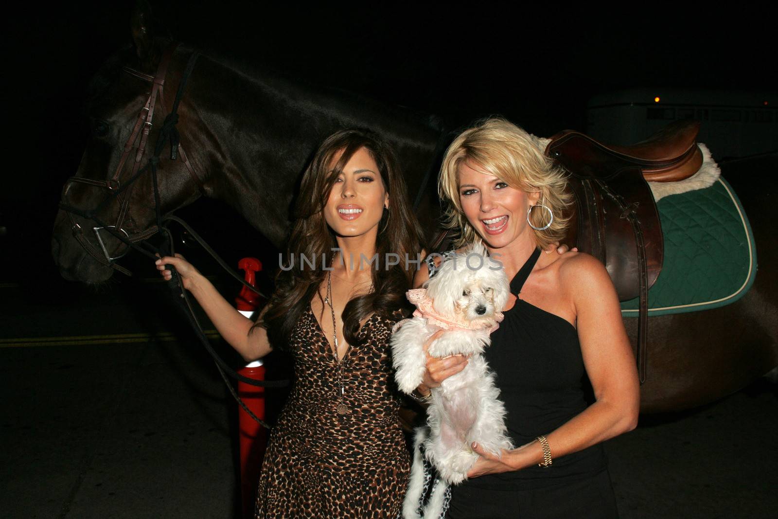 Kerri Kasem and Tamie Sheffield arriving on Sunset Blvd. at the In Touch Pets and their Stars Party with her horse "Playboy," Cabana Club, Hollywood, CA 09-21-05