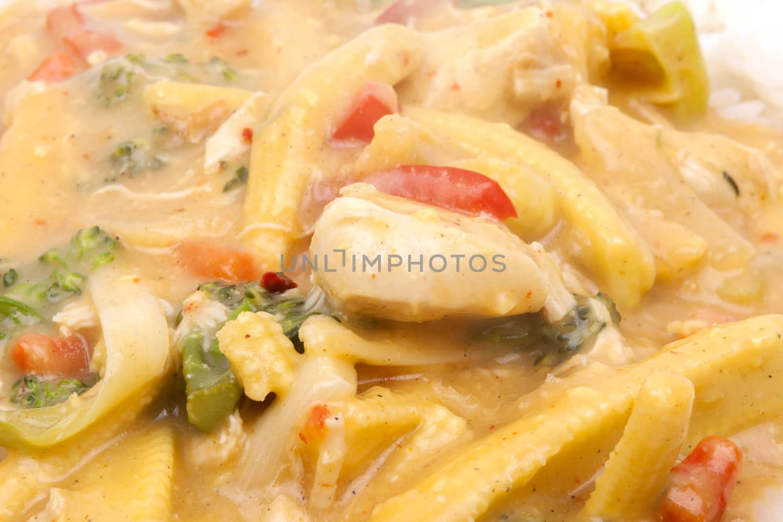 diced chicken in coconut curry sauce served with rice