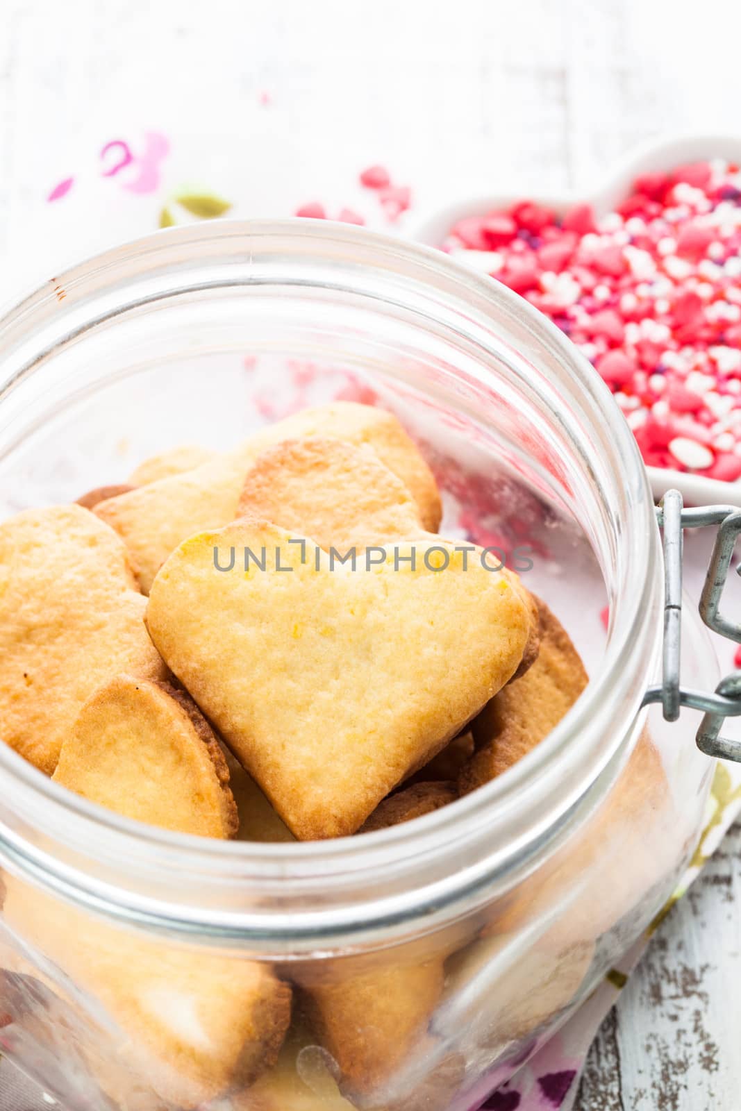 Cookie as a heart shaped valentine decor in glass jar