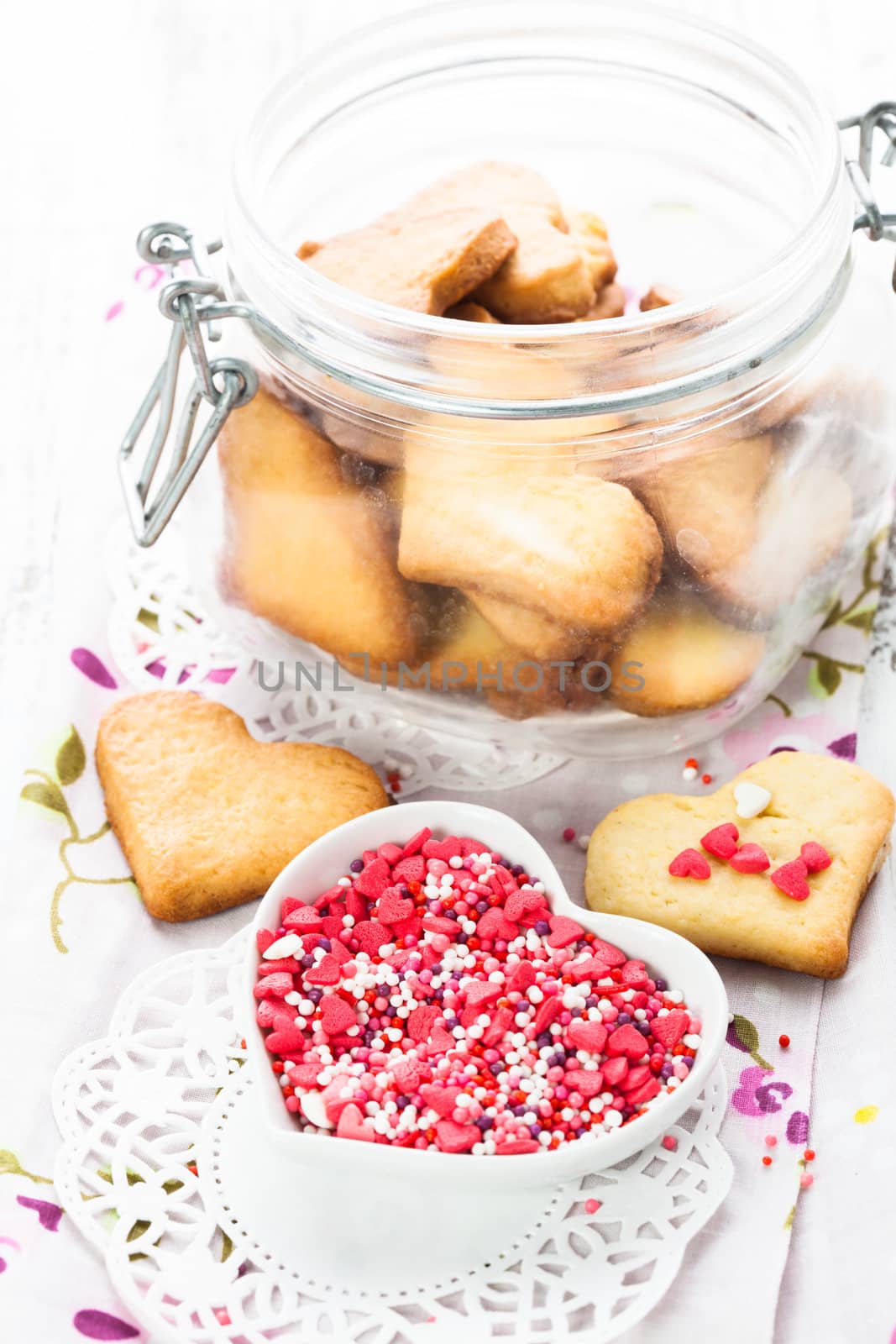 Cookie as a heart shaped valentine decor in glass jar