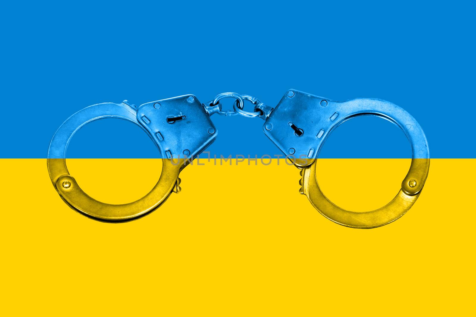 Concept of National Ukrainian Flag and Handcuffs