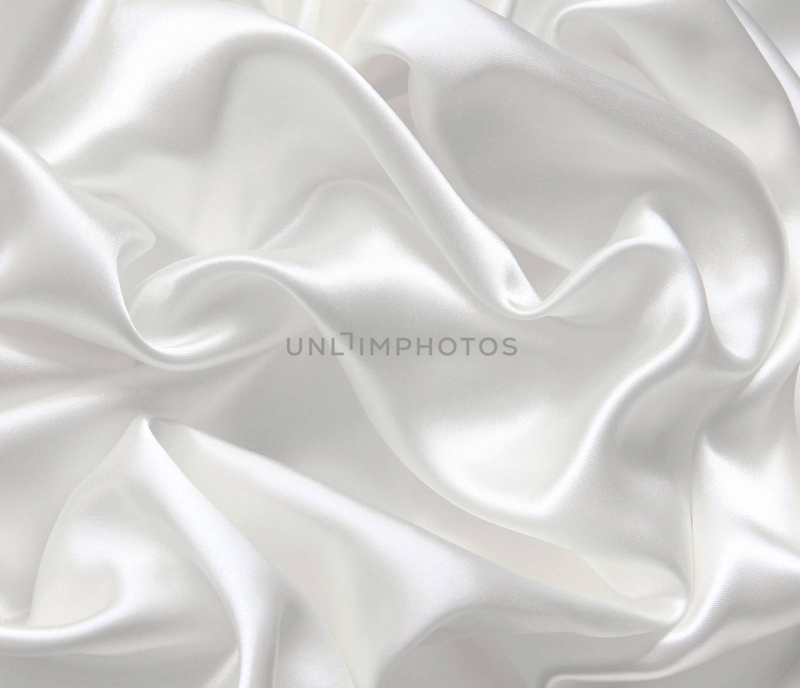Smooth elegant white silk can use as wedding background 