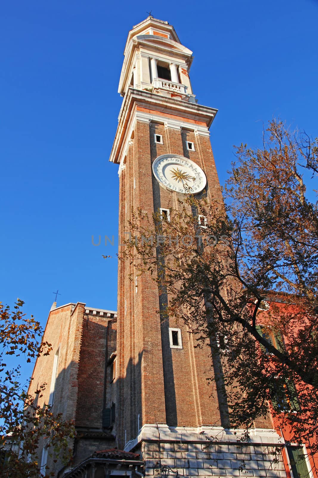 Italy. Venice. Chiesa dei Santi Apostoli church. Clock-tower