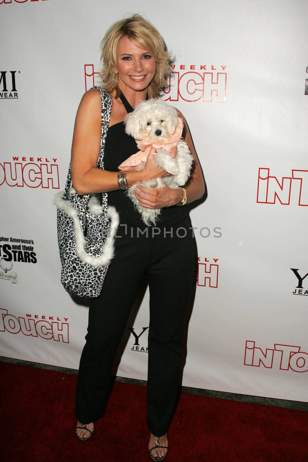 In Touch Presents Pets And Their Stars by ImageCollect