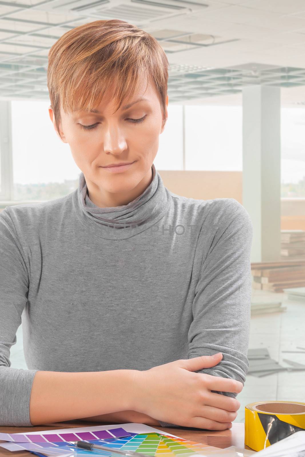 female worker at table see on color palette