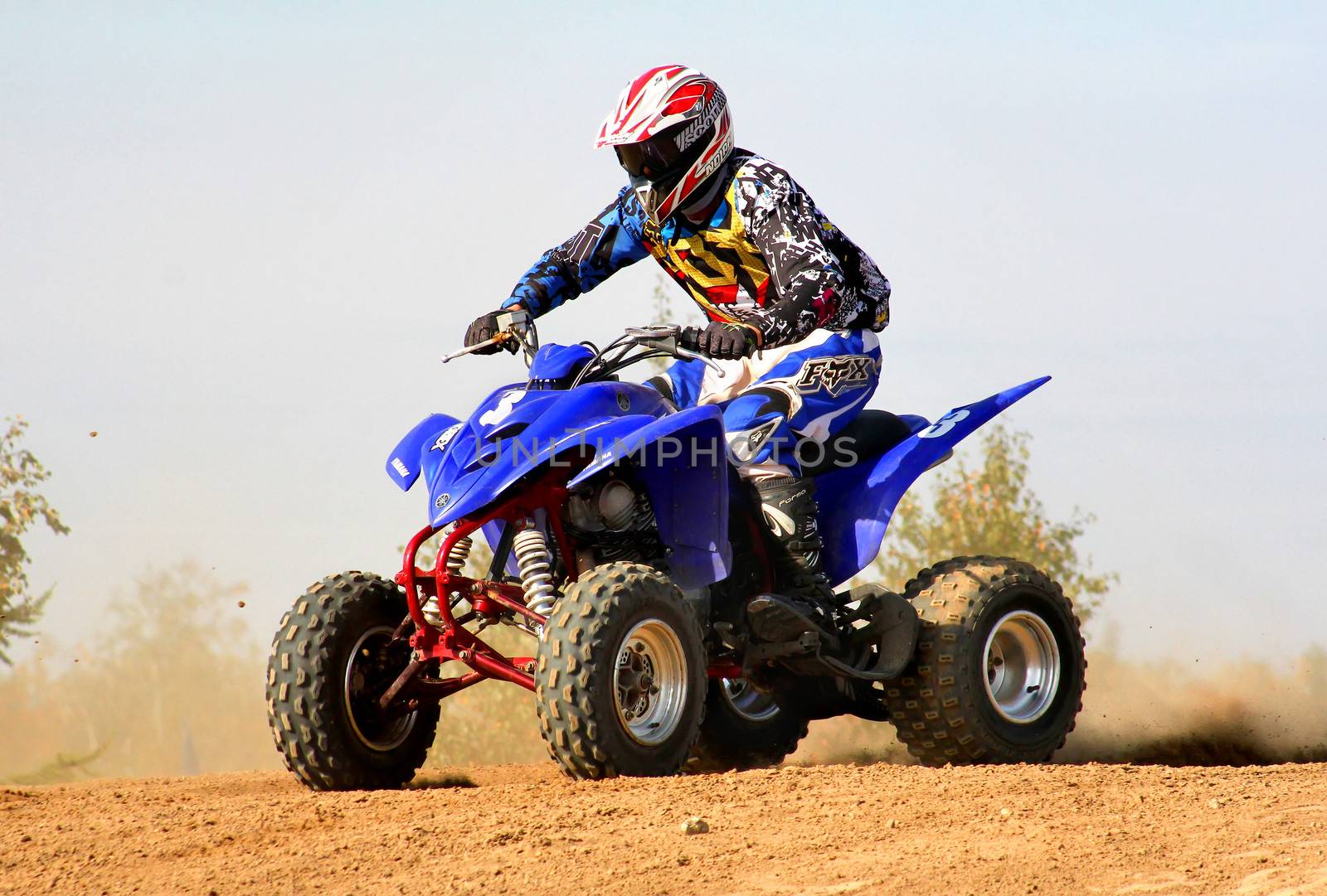 NOVYY URENGOY, RUSSIA - AUGUST 30: Undefined competitor's quad bike Yamaha No. 3 competes at the annual Russian Motocross Championship on August 30, 2012 in Novyy Urengoy, Russia.