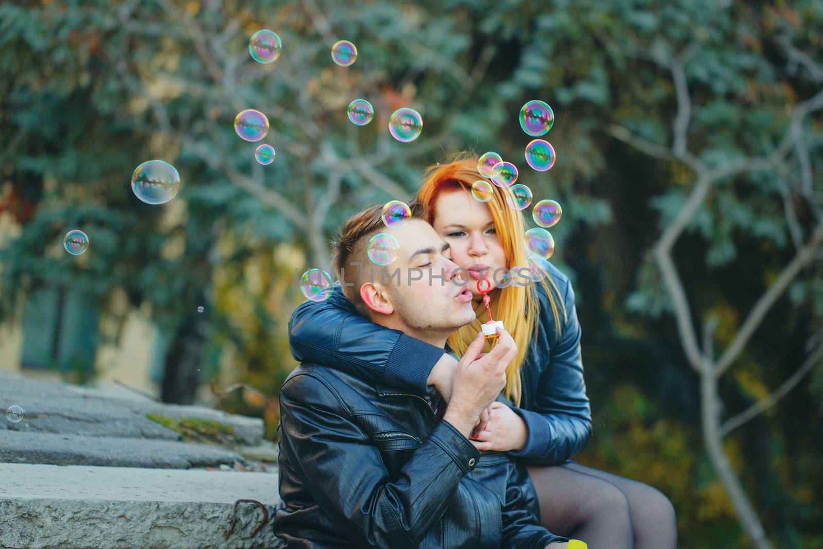 Couple starts soap bubbles by Vagengeym