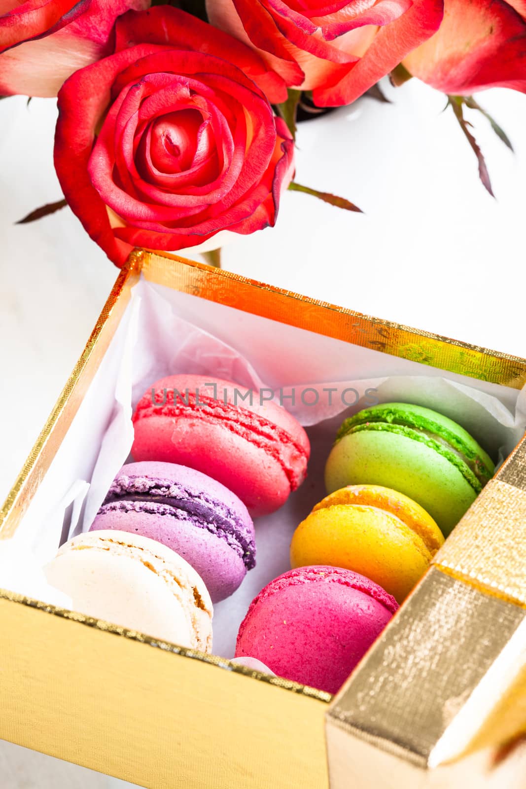 macaroons in gift box by oksix