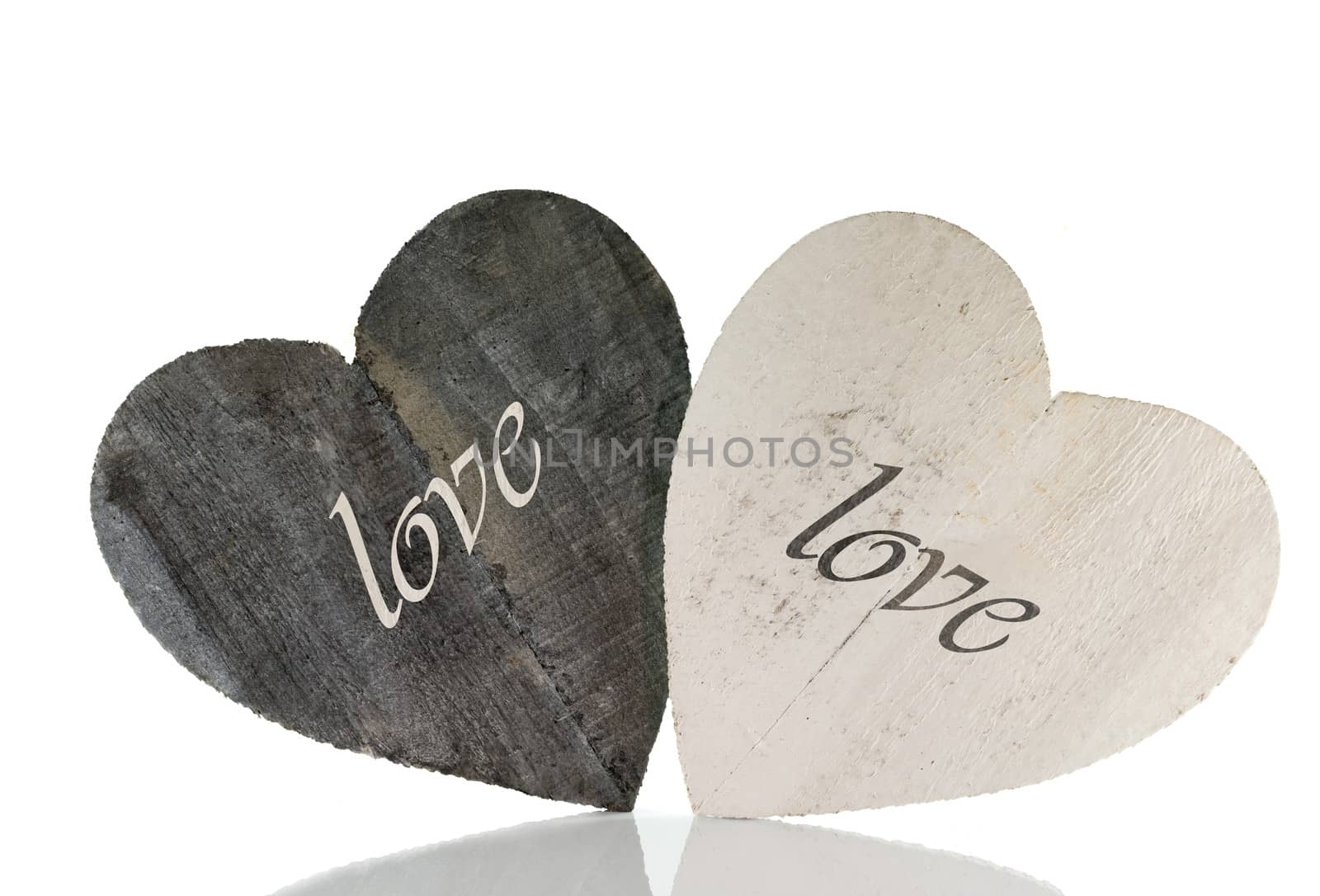 two wooden heart shapes for valentines with space for text isolated on white background