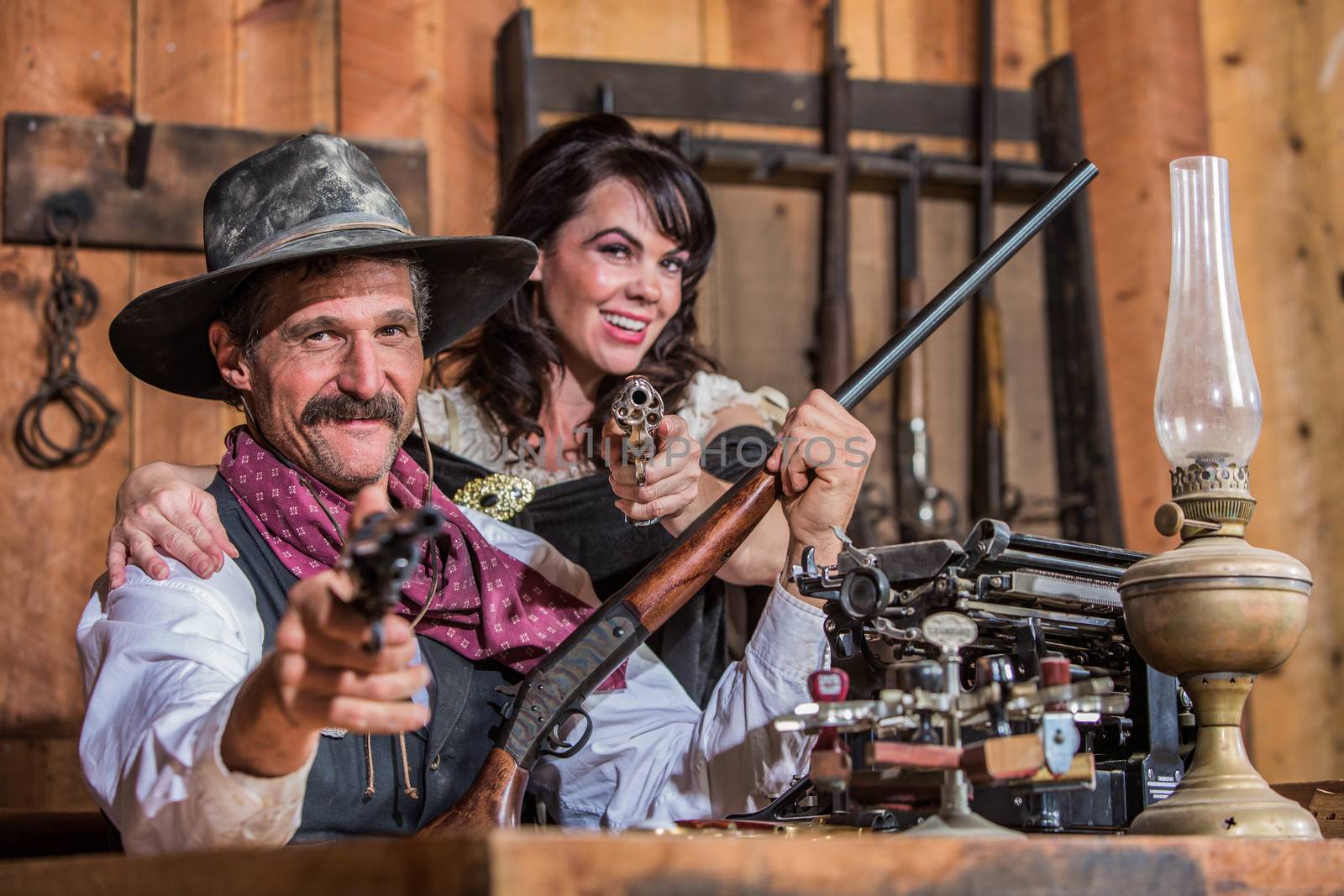 Smiling Sheriff Points Gun With Woman by Creatista