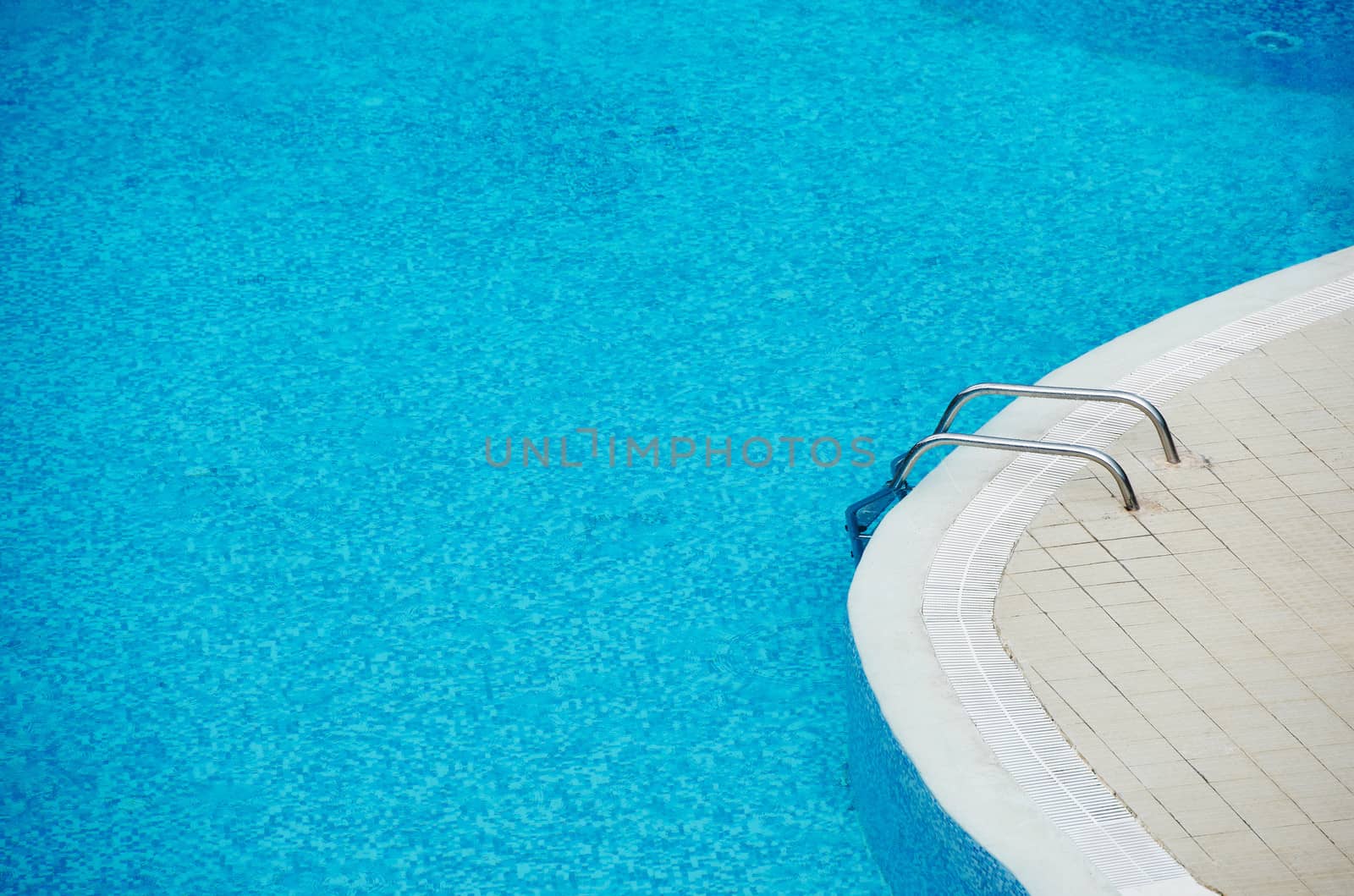 Swimming pool with clear blue water