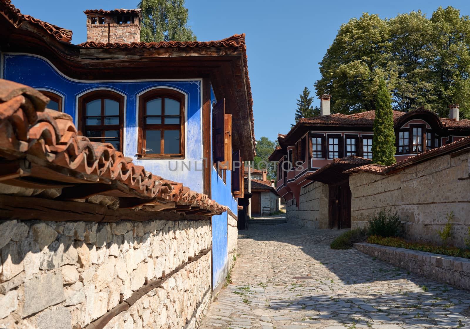 Street with traditional houses in Koprivshtitsa village, Bulgaria