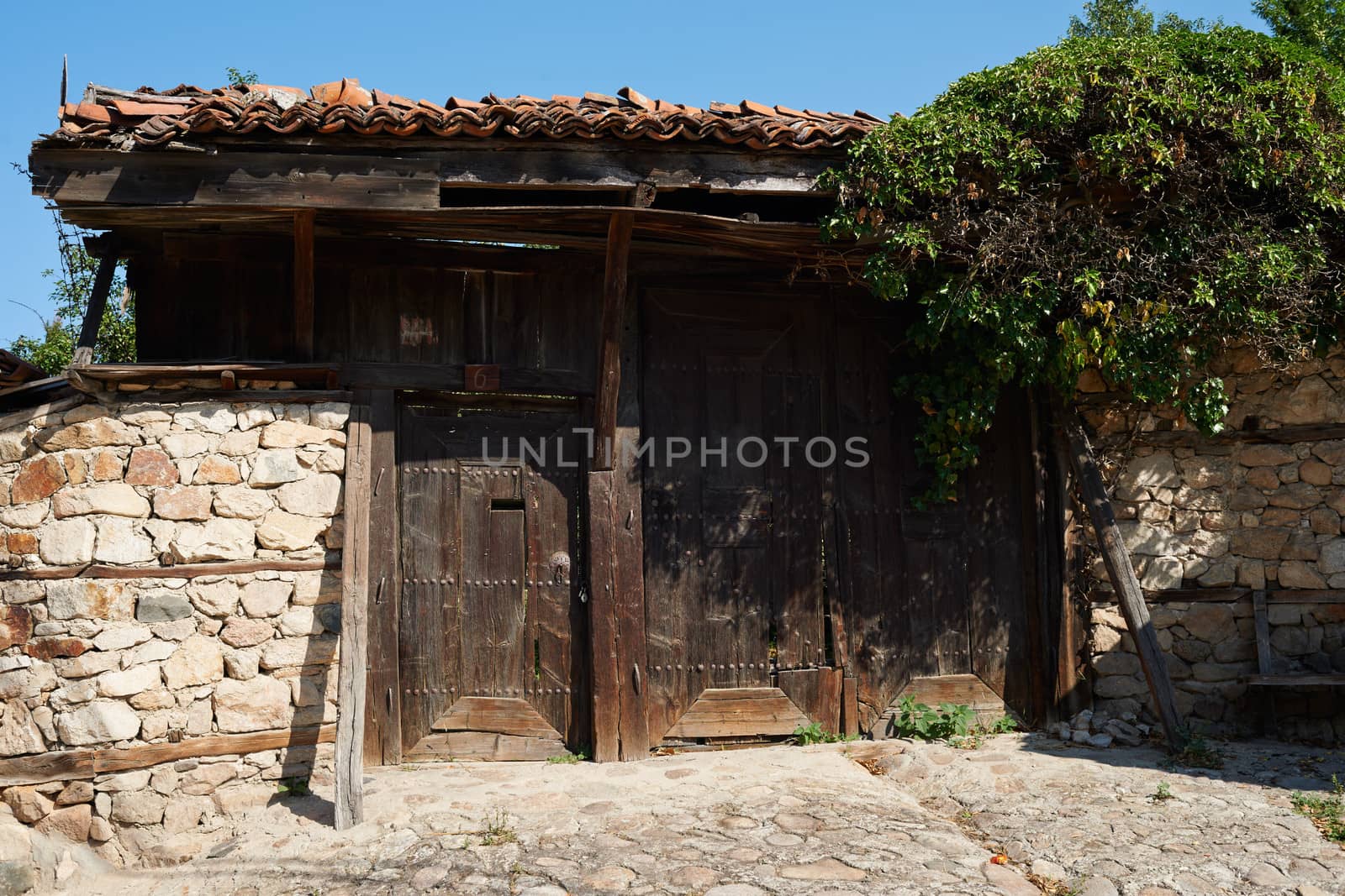 Old wooden gate from the Revival period in Koprivshtitsa village, Bulgaria