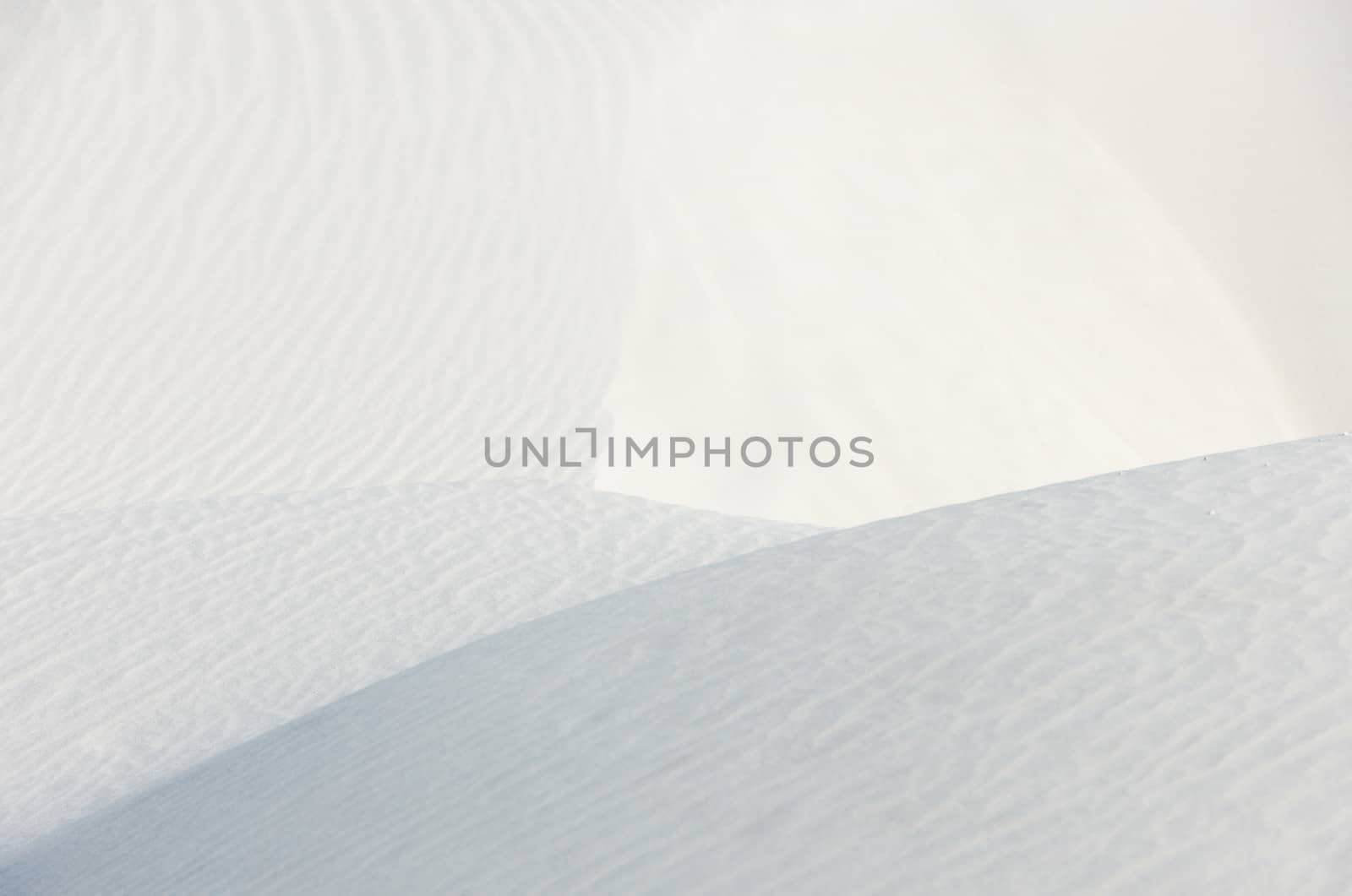 Ridges and waves on white quartz sand