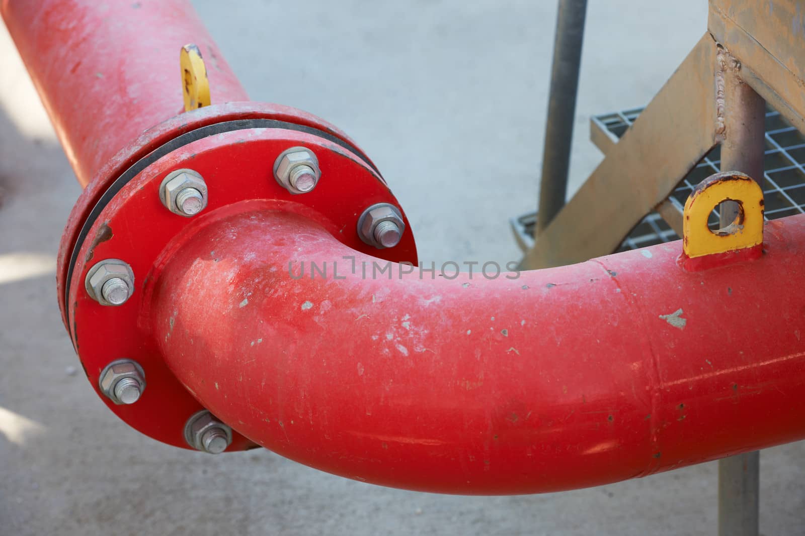 Industrial red pipe for high pressure liquid connected with flange
