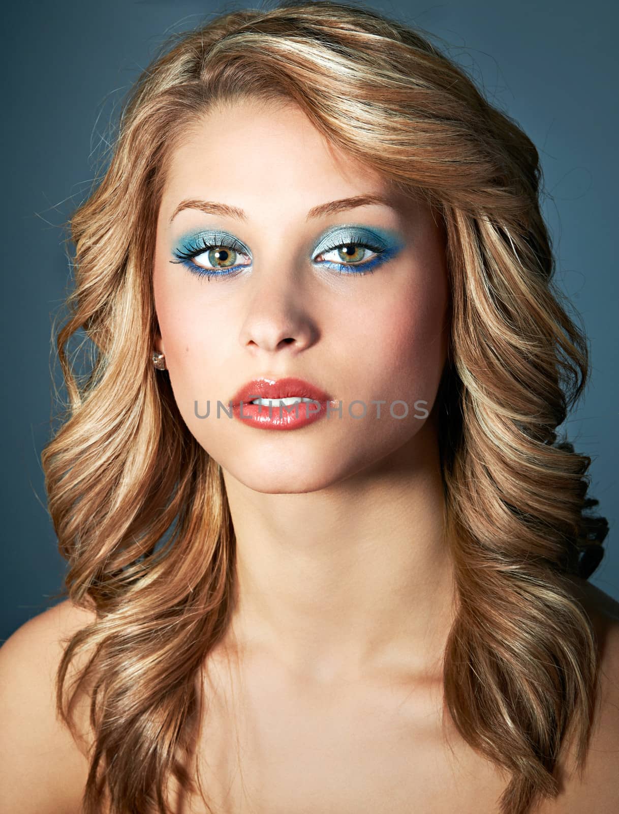 Beauty headshot of model girl young woman with blond hair and healthy skin