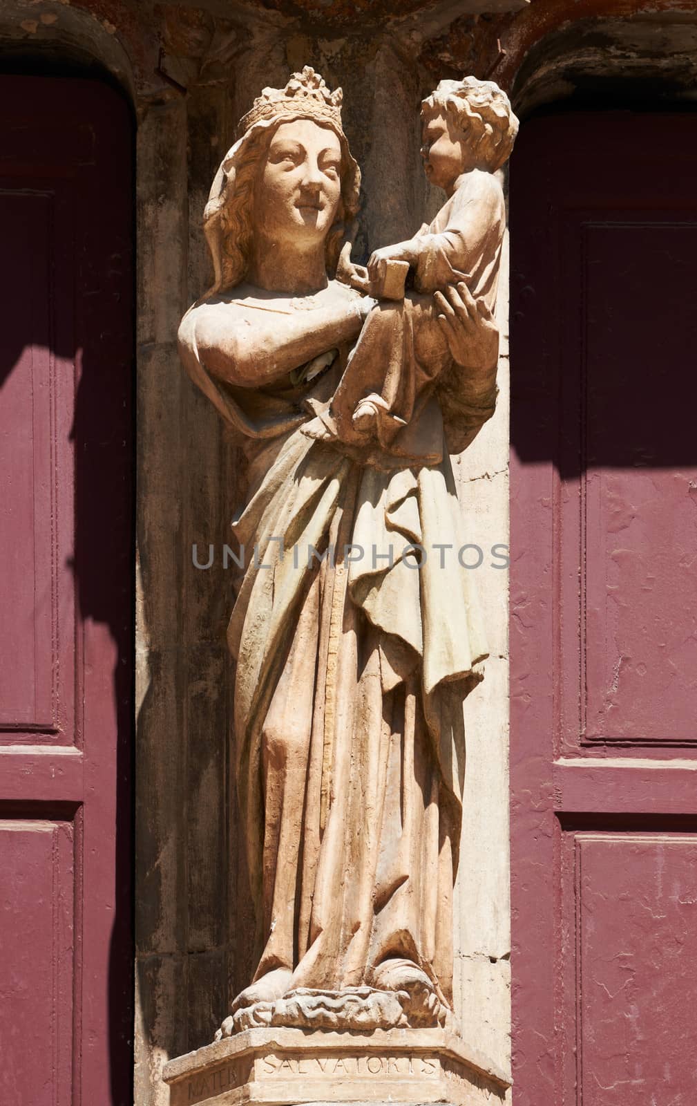 Holy Maru statue on facade of cathedral Saint-Sauveur in the ancient part of Aix en Provence town, South France