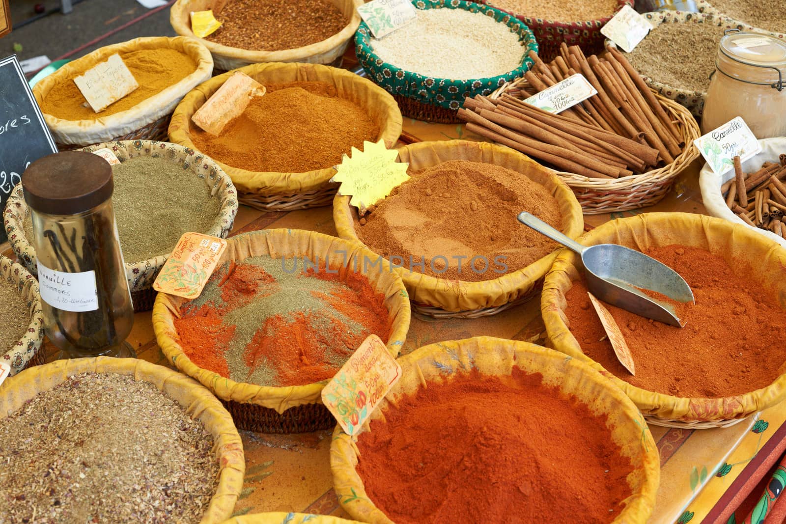 Random aromatic spices including paprica, curcuma and other for sale on Aix en Provence market, South France