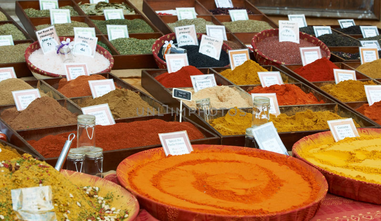 Random sorts of spices for sale at French Provence market in Aix en Provence town