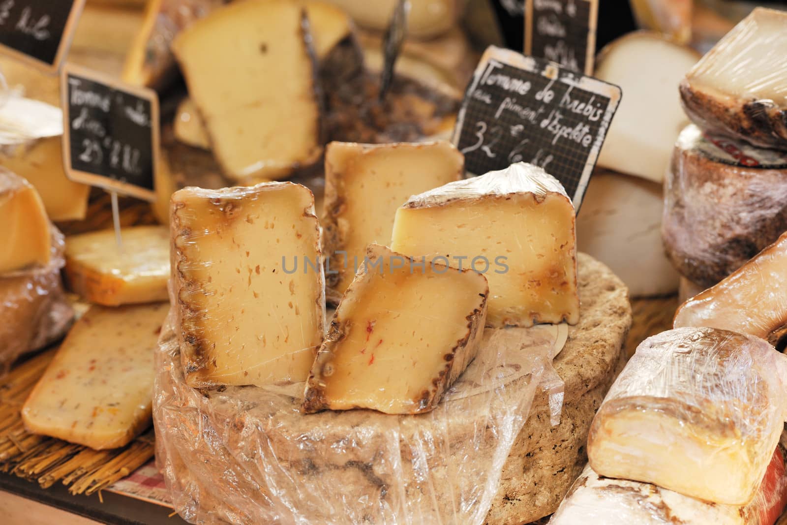 Yellow french cheese at Provence market