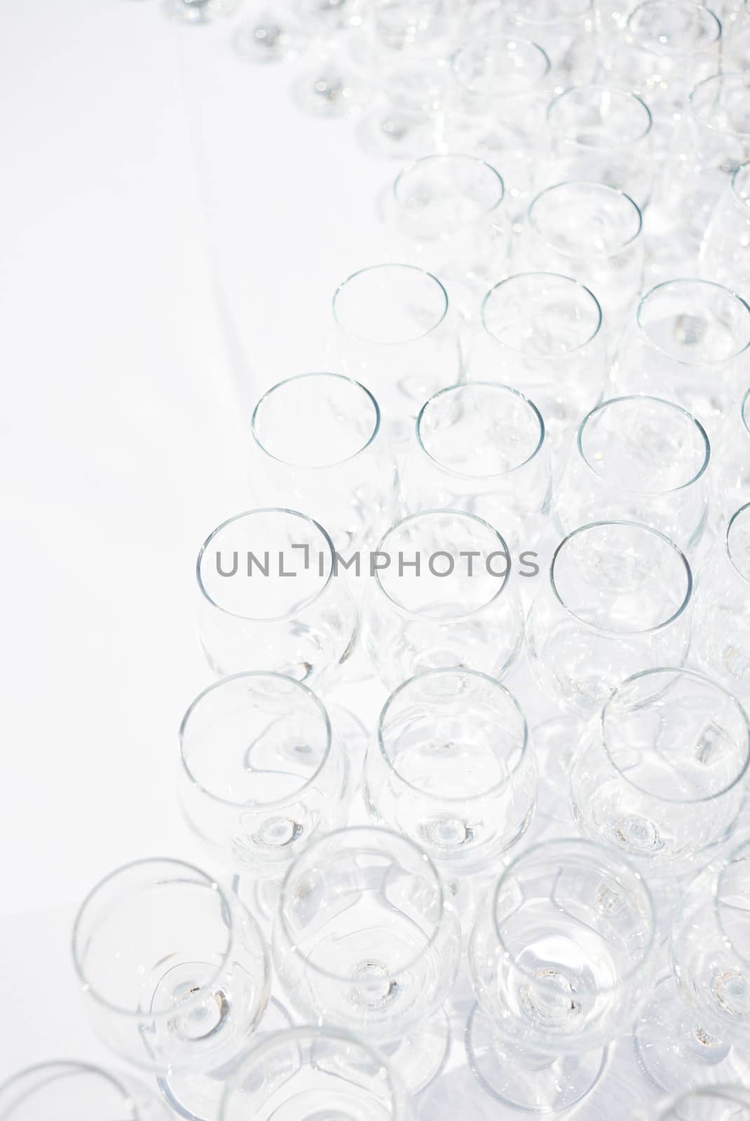 Multiple emptyparty glasses on table