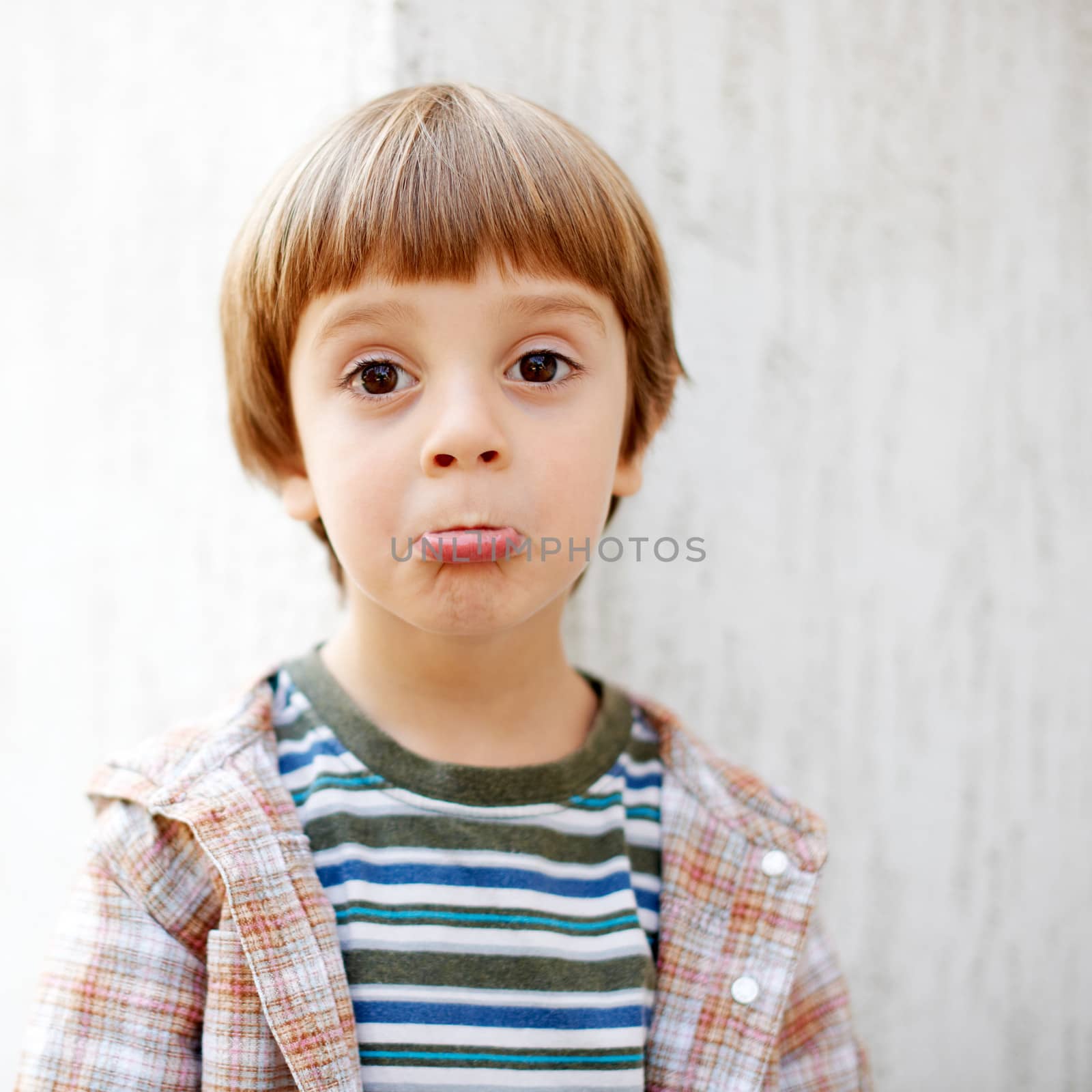 Little boy with funny face by ecobo