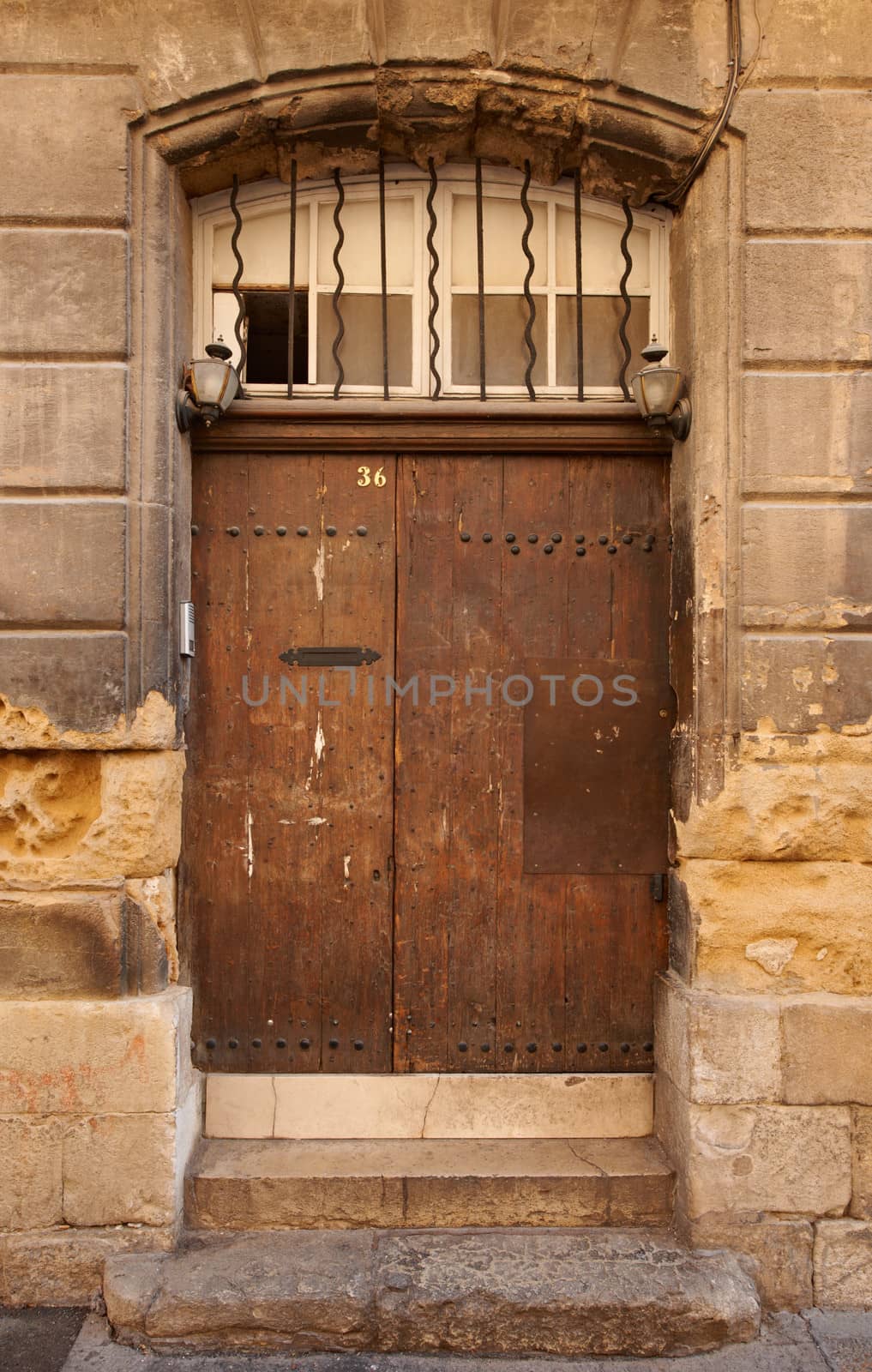 Old wooden door in Aix en Provence, France