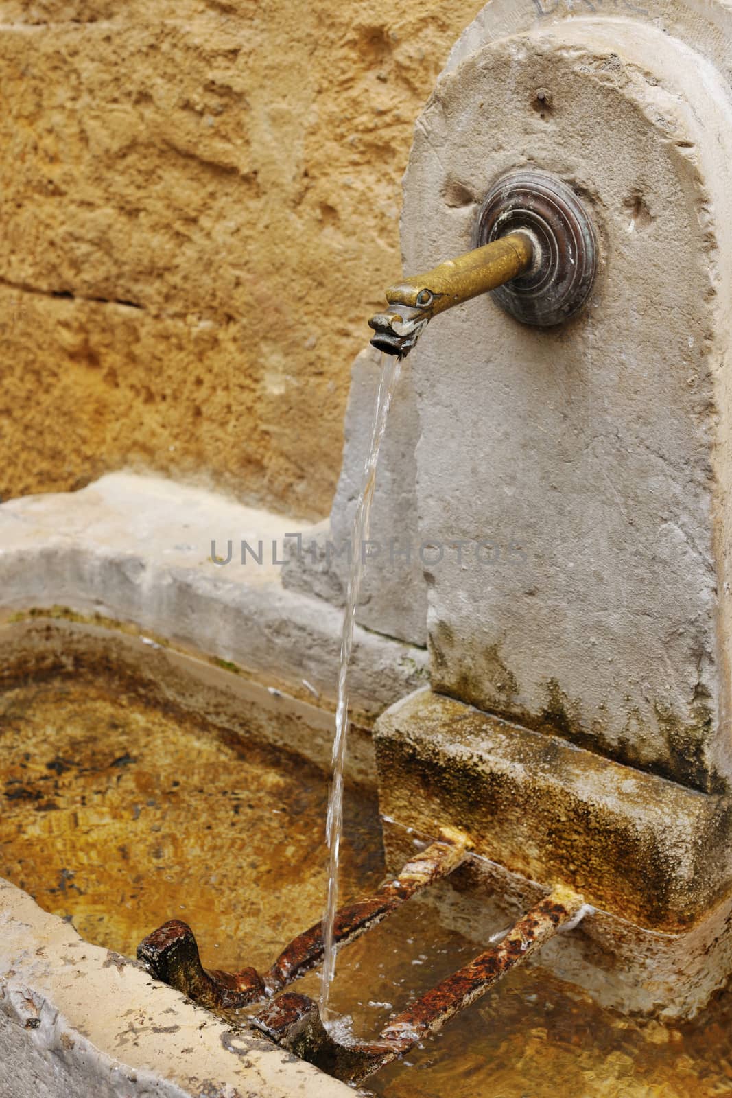 Ancient fountain in Aix en Provence