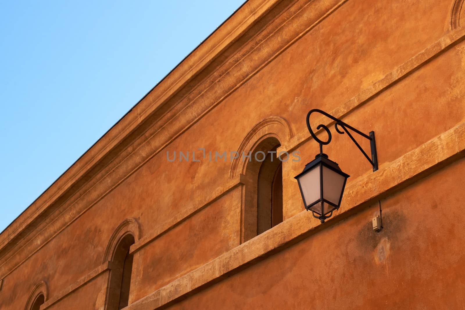 Facade with lantern in Aix en Provence, France