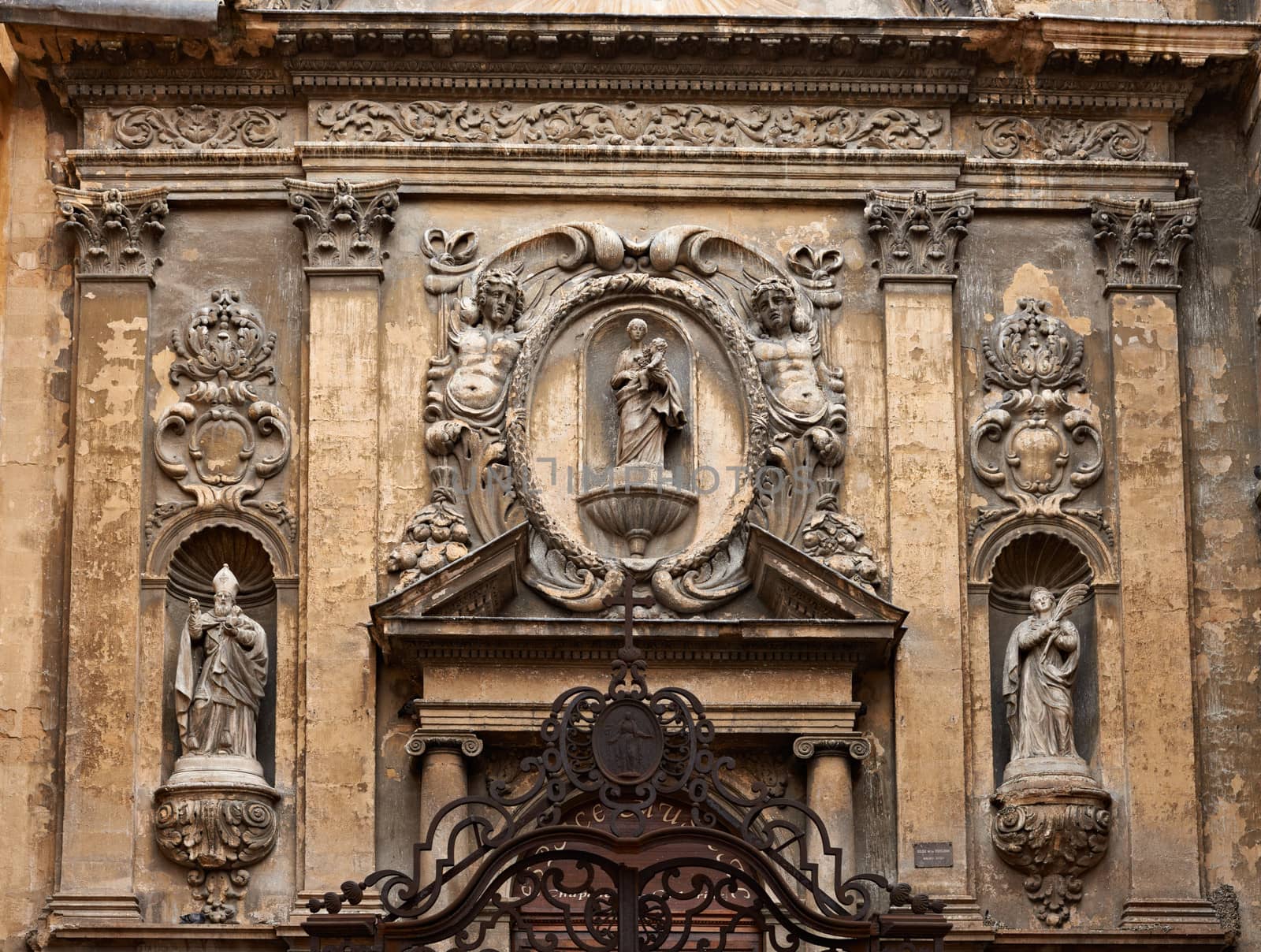Cathedral facade in Aix en Provence with rich decoration