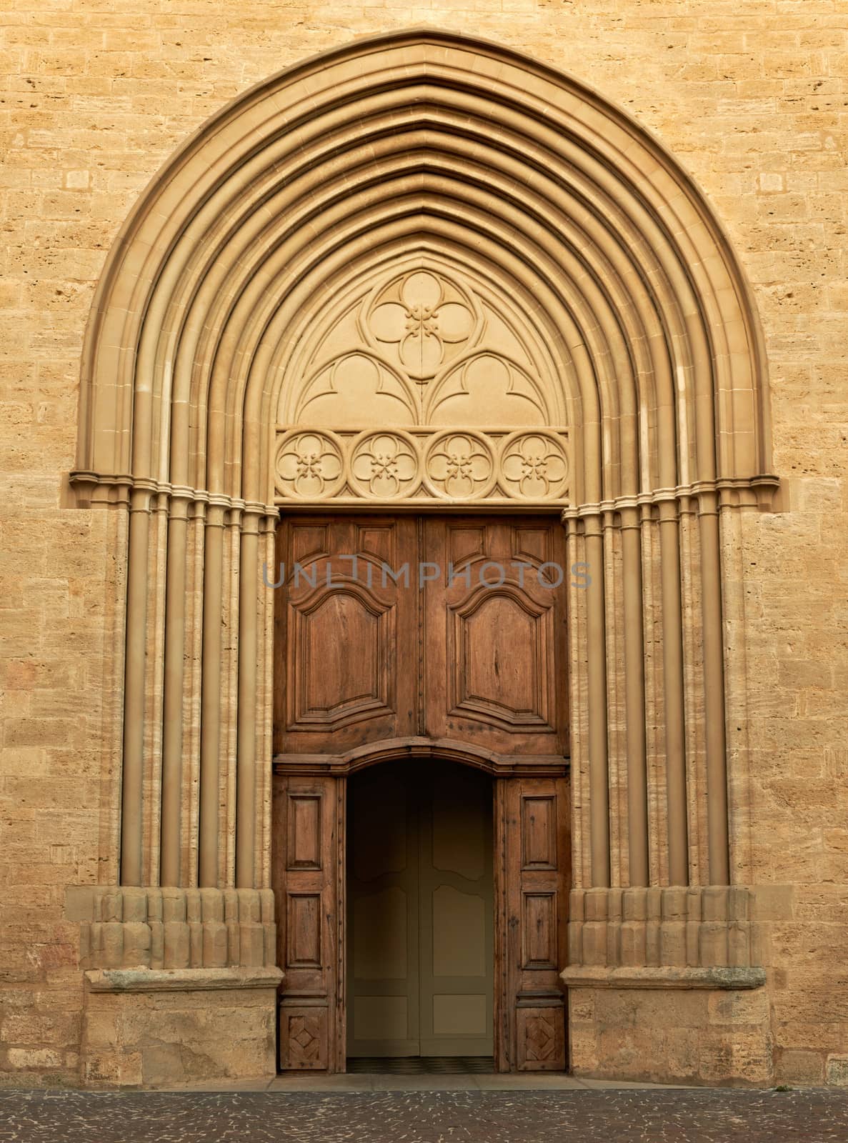 The gate of the cathedral in Cucuron, Provence, France