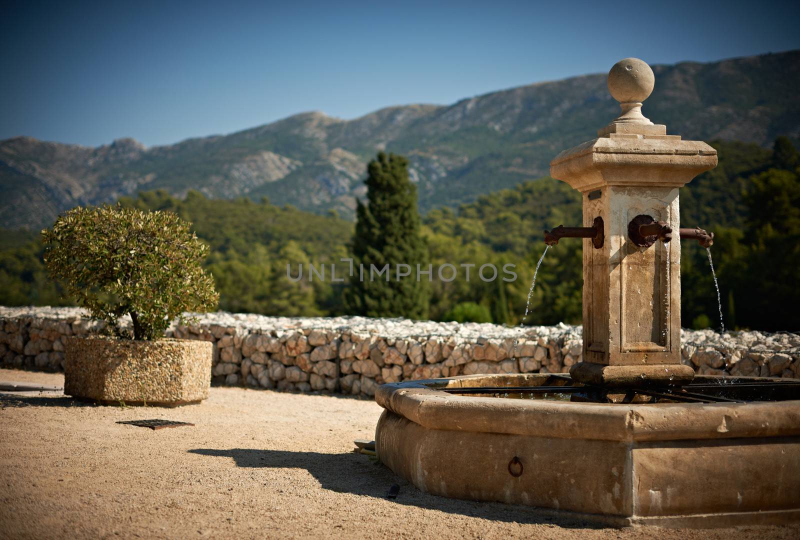 Old fountain in the village of Vauvenargues, French Provnece