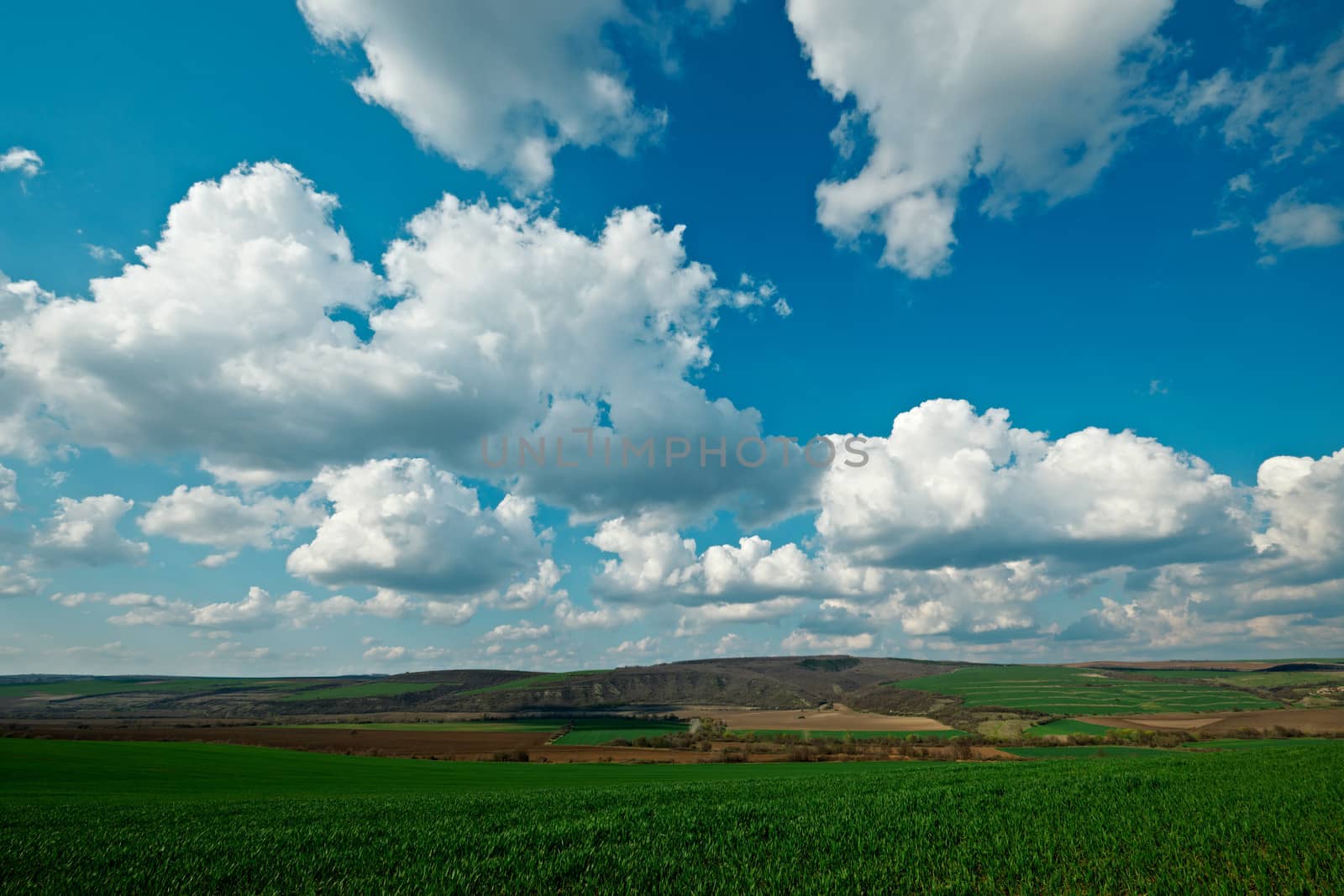 Spring landscape with clouds by ecobo