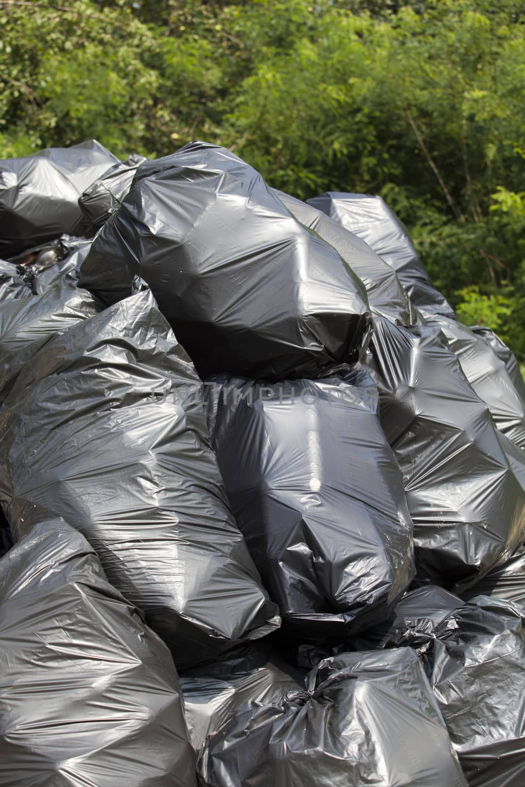 A pile of black garbage bags