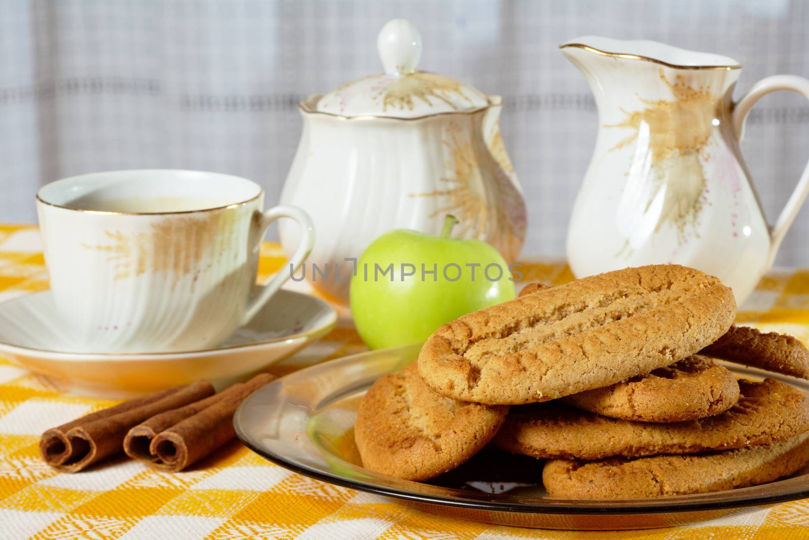 Breakfast with cinnamon cookies, coffee and green apple by ecobo