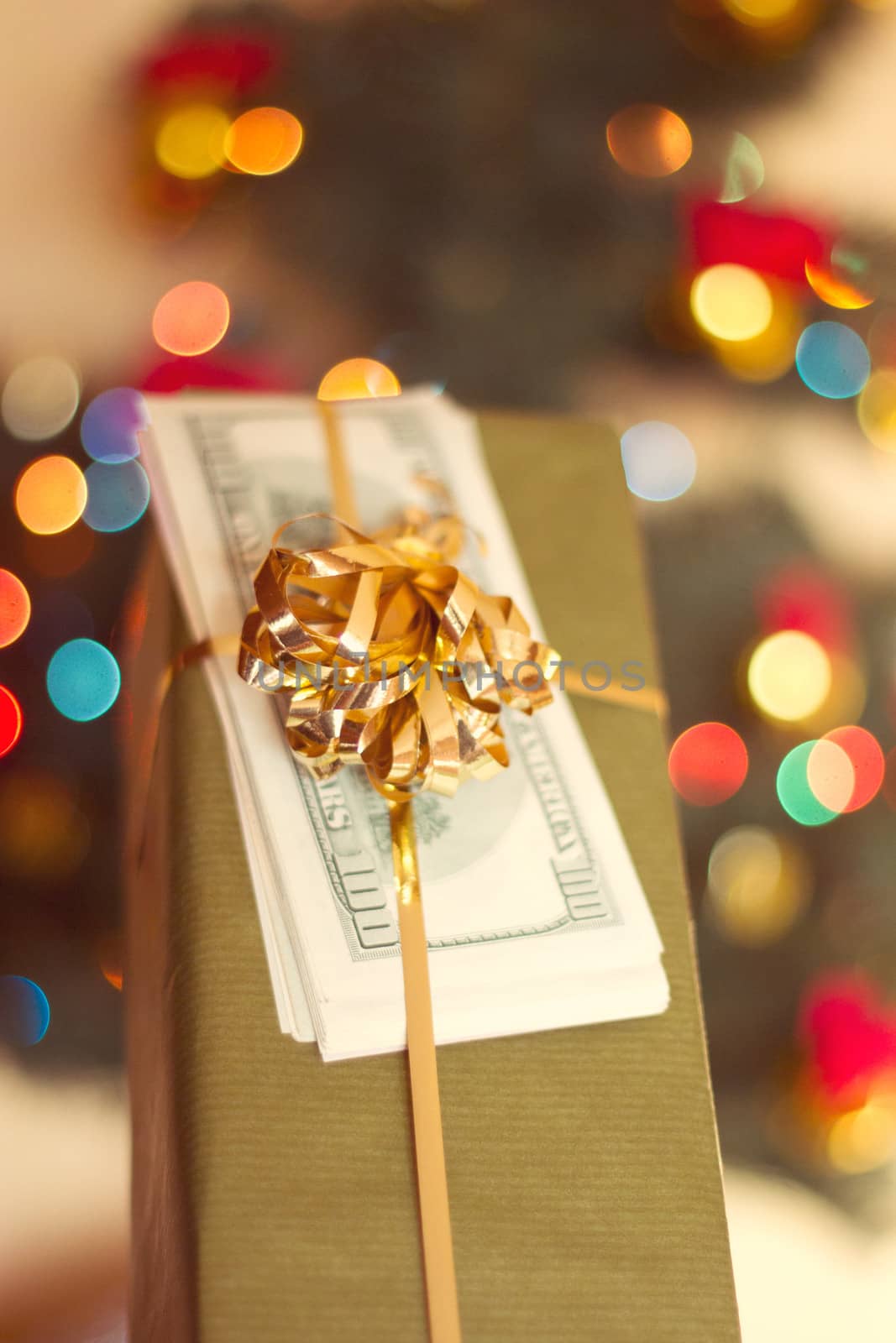 Gift box and US dollar bills