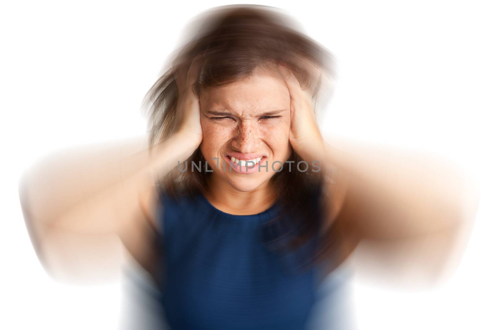 Woman suffering from an headache, holding her hands to the head, with radial blur effect applied