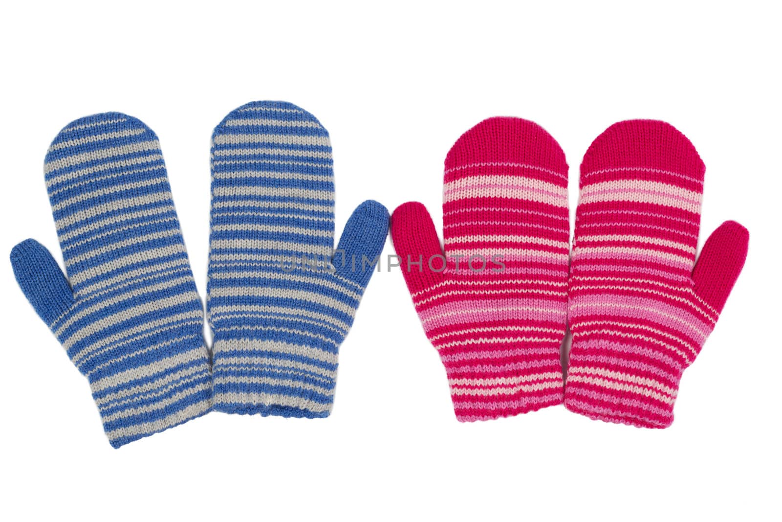 Two pairs of mittens, blue and red. Isolate on white.