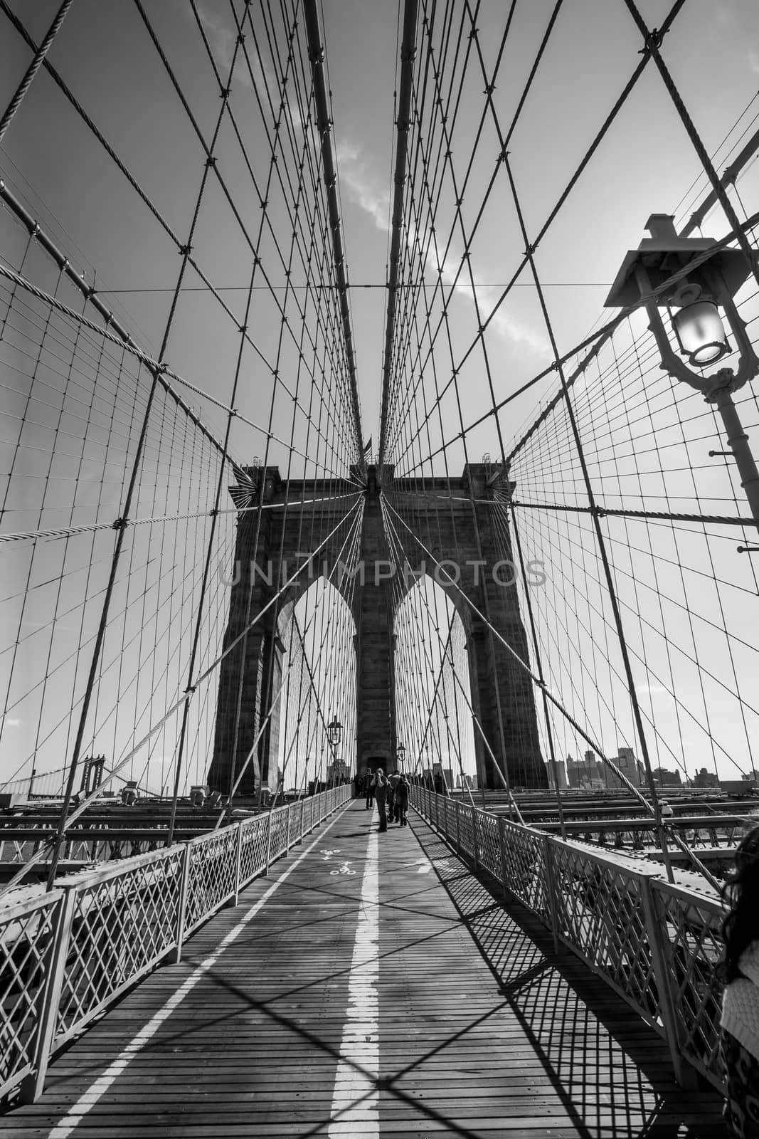Photo of the Brooklyn Bridge in New York done in black and white.