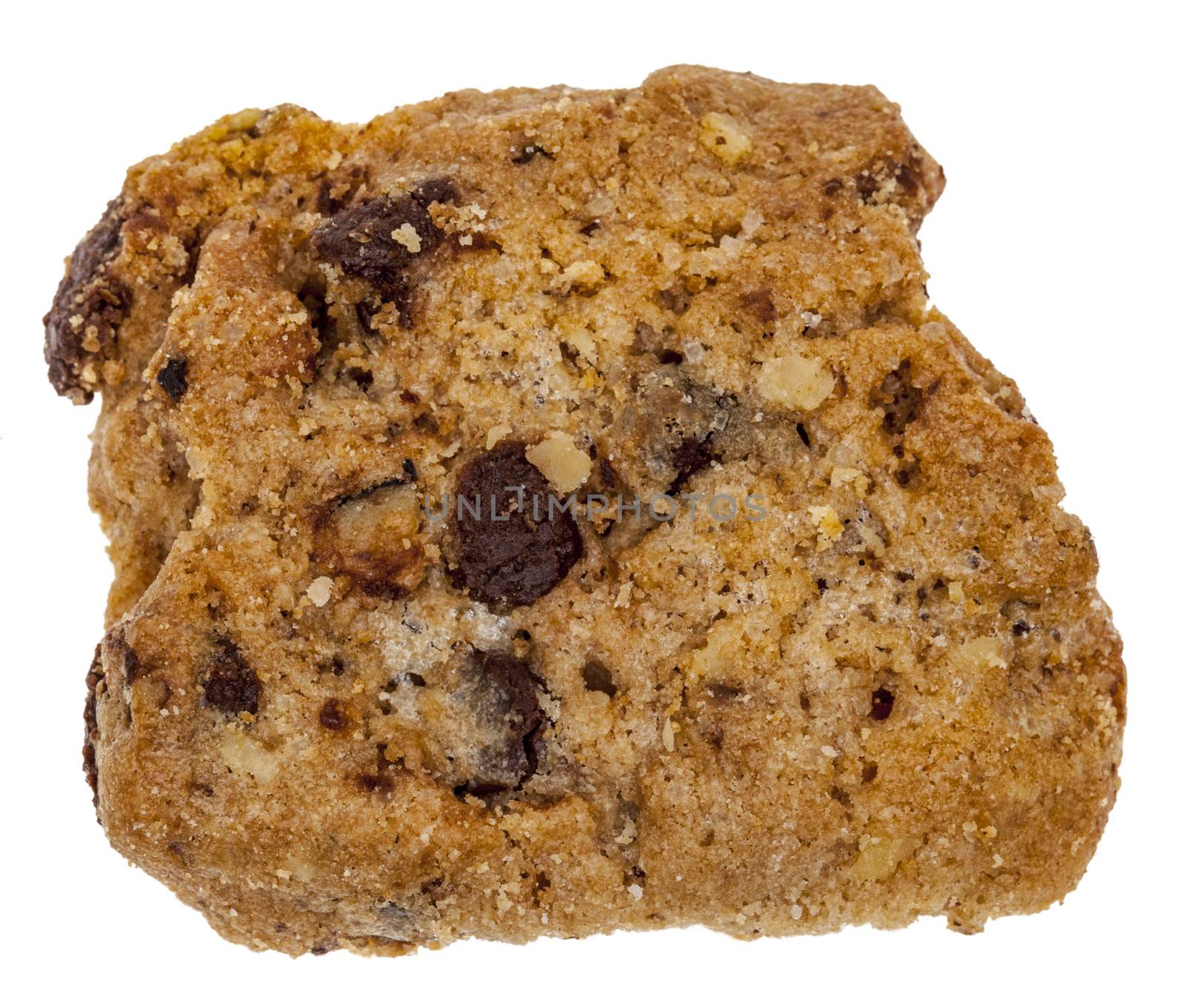 Upper view of a cookie with chocolate pieces,isolated against a white background.