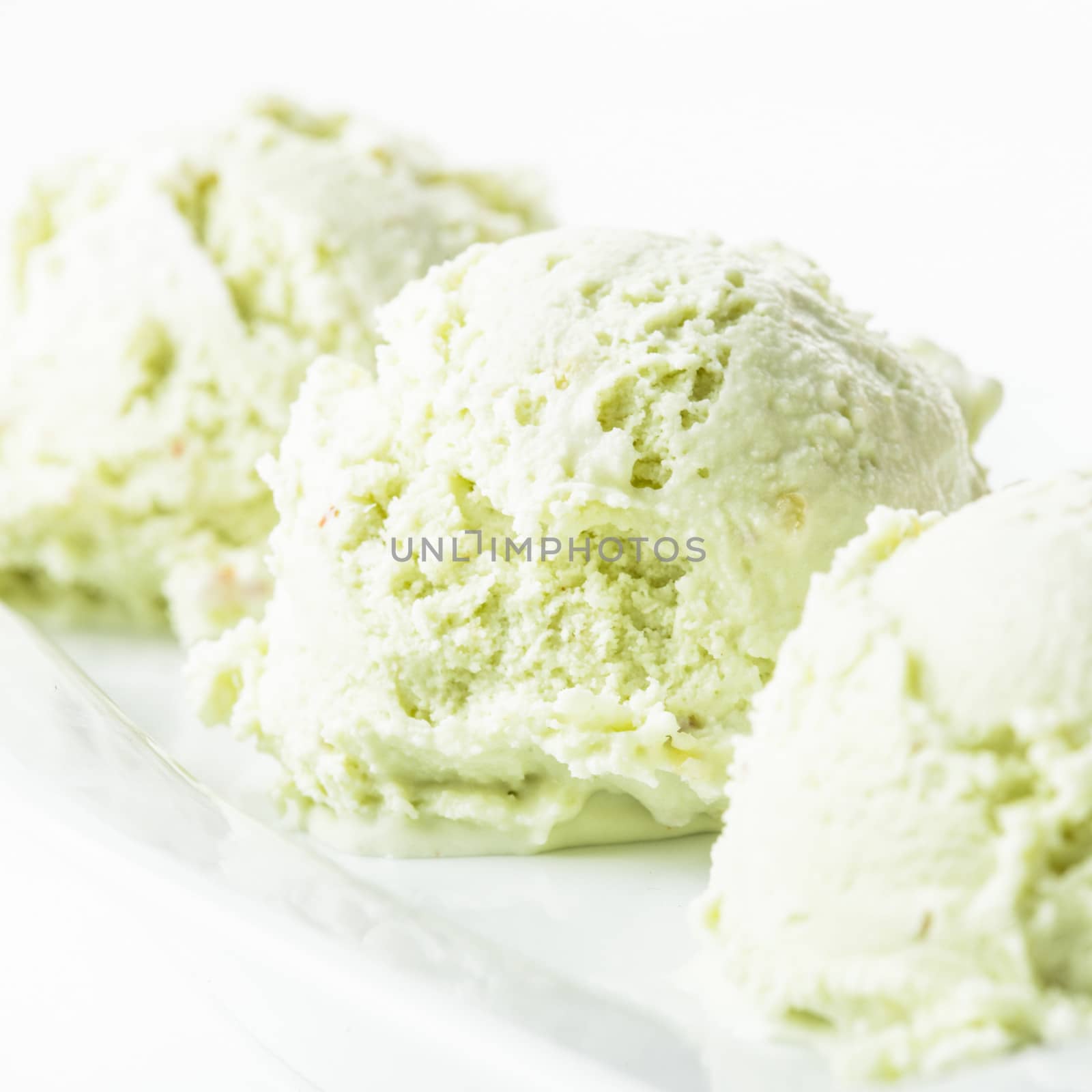 pistachio ice cream on the plate close up