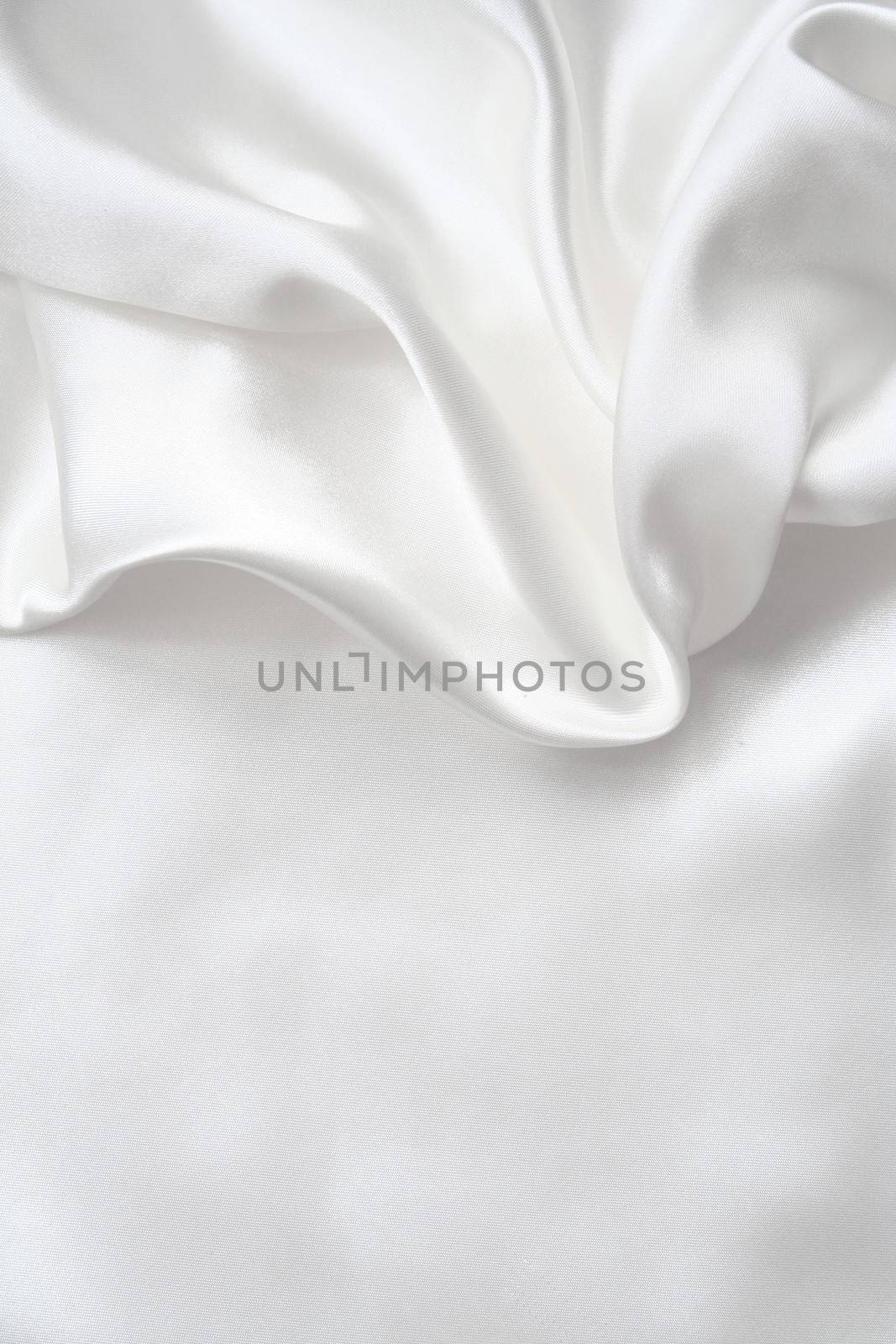 Smooth elegant white silk can use as wedding background 