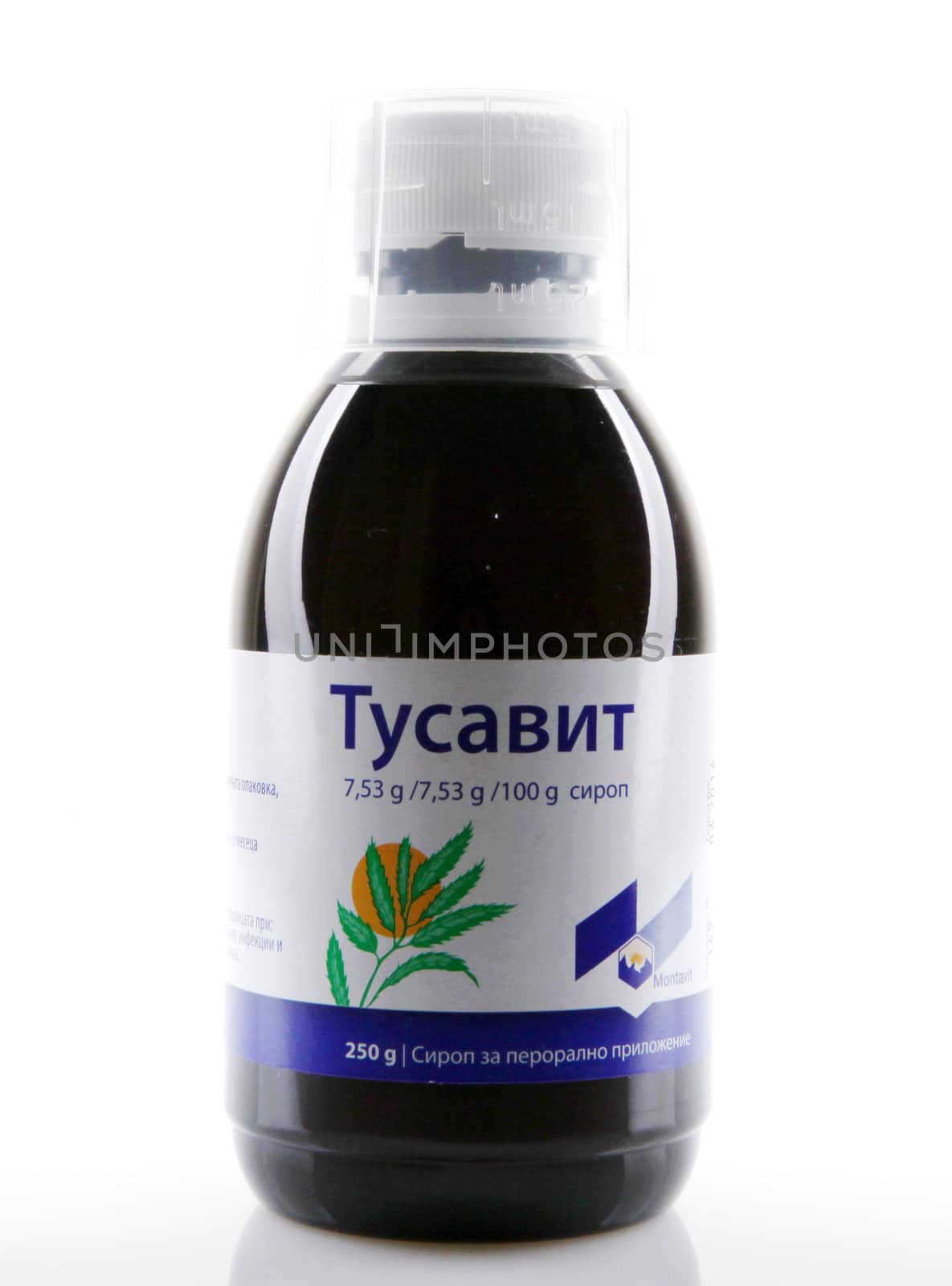 AYTOS, BULGARIA - JANUARY 28, 2014: Liquid medicine in glass bottle - Tusavit.