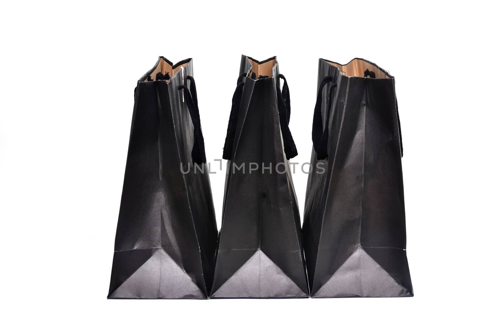black paper bag isolated on white background
