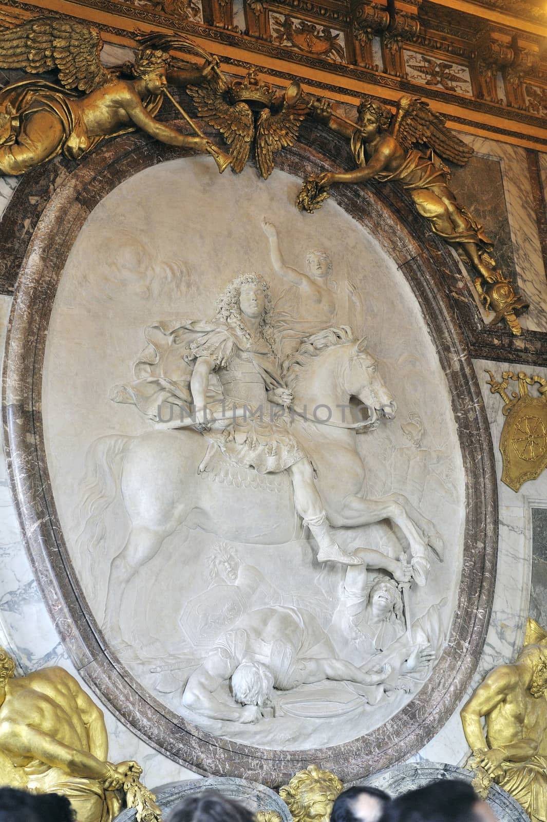 a bas-relief of the castle of Versailles
