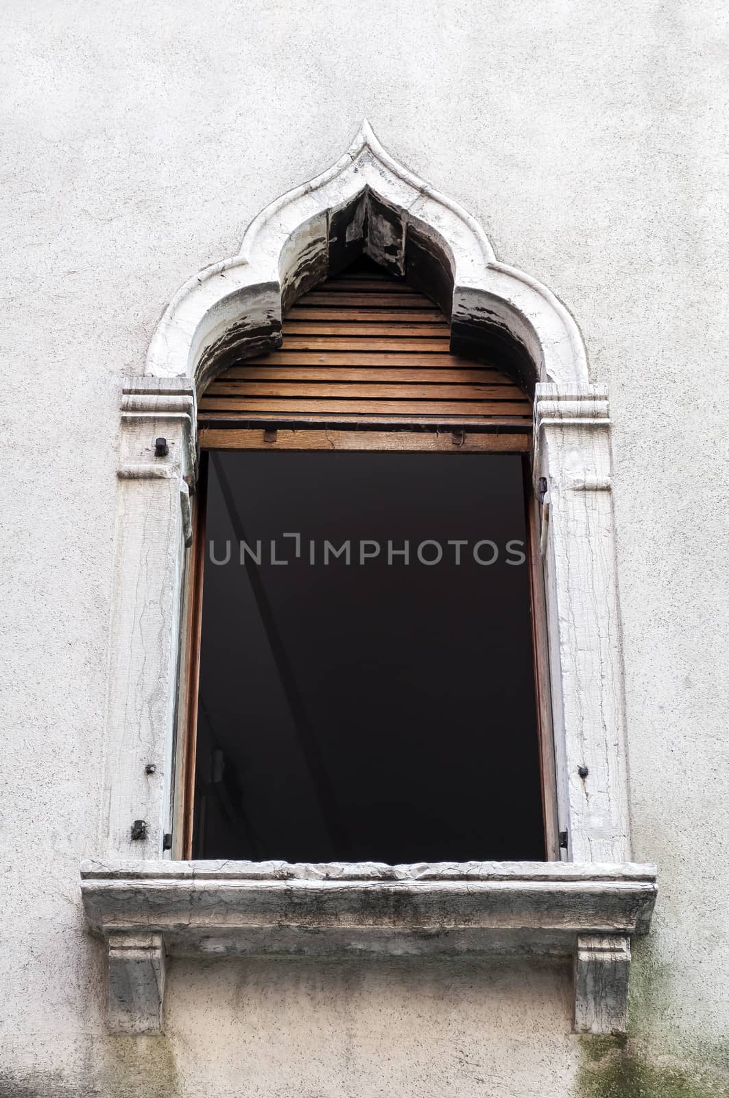 Detail of Venetian architecture. Typical window in Venice, Italy.