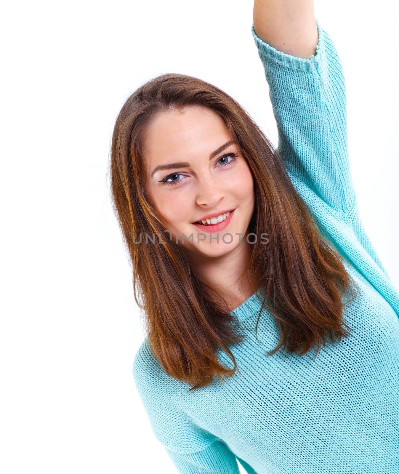 Portrait of happy teenage girl in a blue dress. Isolated over white background.