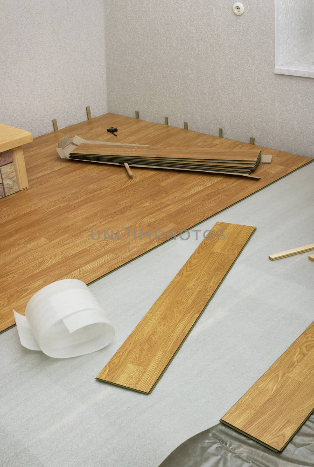 Laying indoors laminated panels the color of the wood