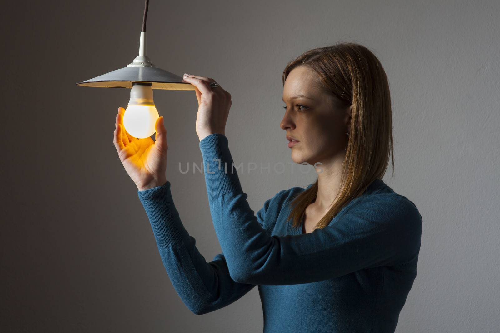 woman with a light bulb