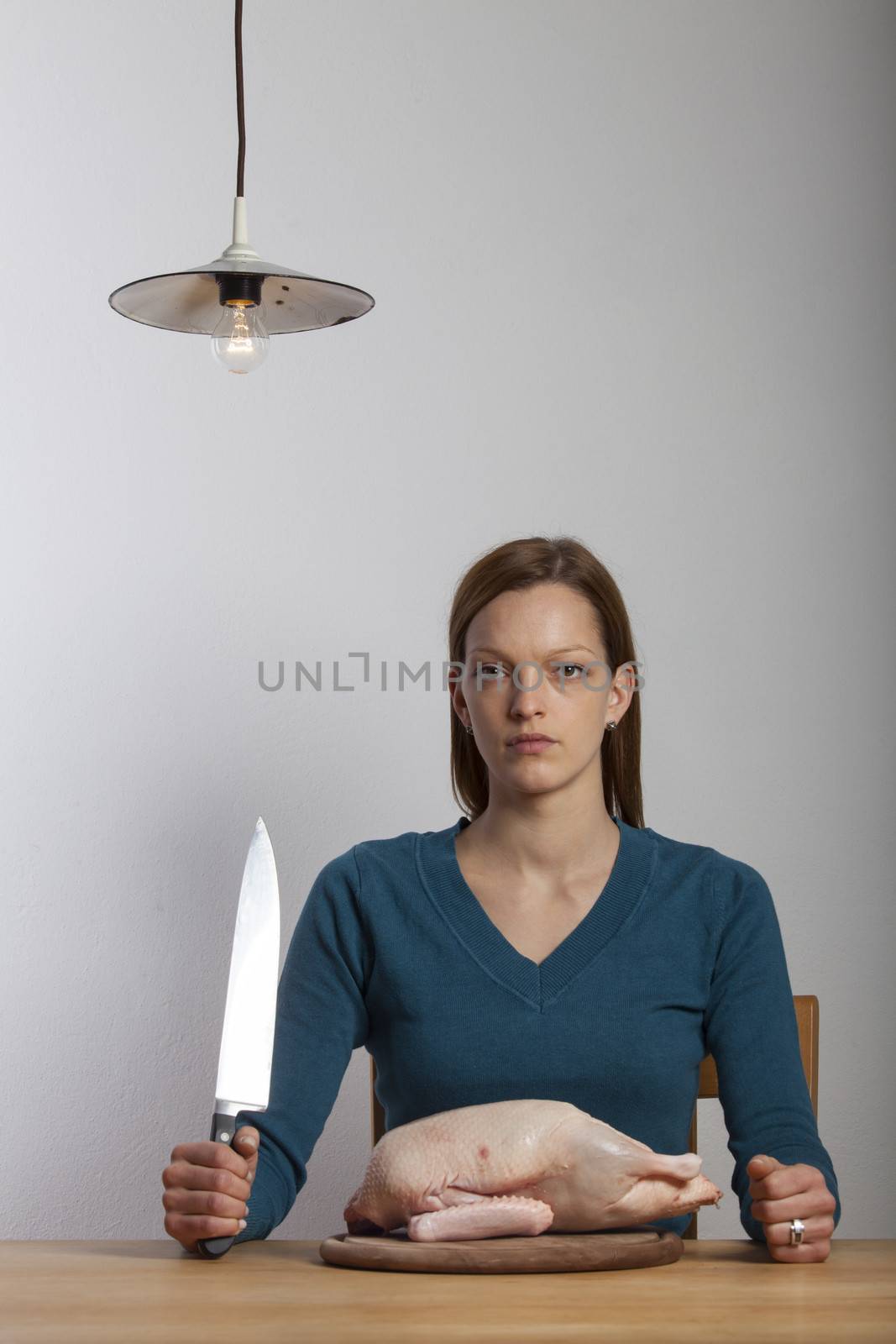 woman and a knife on a table